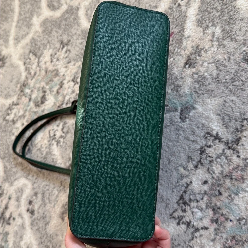 Kate Spade Brynn leather tote bag in the deep jade color with bow charm